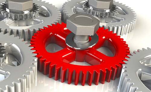 Metall-Zahnräder und ein Schraubenschlüssel