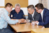 Wolfgang Fröschl, Peter Ortner, Landesrat Dr. Wolfgang Hattmannsdorfer und Ing. Karl-Heinz Koll sitzen um einen Tisch