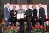 Landesrat Markus Achleitner, Mag. Othmar Nagl und Bürgermeister Wolfgang Greil stehen mit drei weiteren Personen auf einer mit Blumen geschmückten Bühne