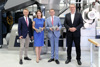 v.l.: DI (FH) Werner Pamminger, Geschäftsführer der Business Upper Austria, Mag.a Dr.in Henrietta Egerth, Geschäftsführerin der FFG, Wirtschafts- und Forschung-Landesrat Markus Achleitner und Patrick Pammer, Geschäftsführer des Competence Center CHASE stehen in einer Werkshalle