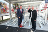 Landesrat Günther Steinkellner und Vizebürgermeister Markus Hein in der Bike-and-Ride-Anlage, überdachte Fahrradständer auf zwei Ebenen